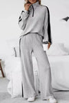 Ladies' winter casual knitted suit with long-sleeved top and trousers.